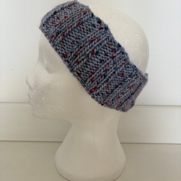 Blue fleck knitted headband. 