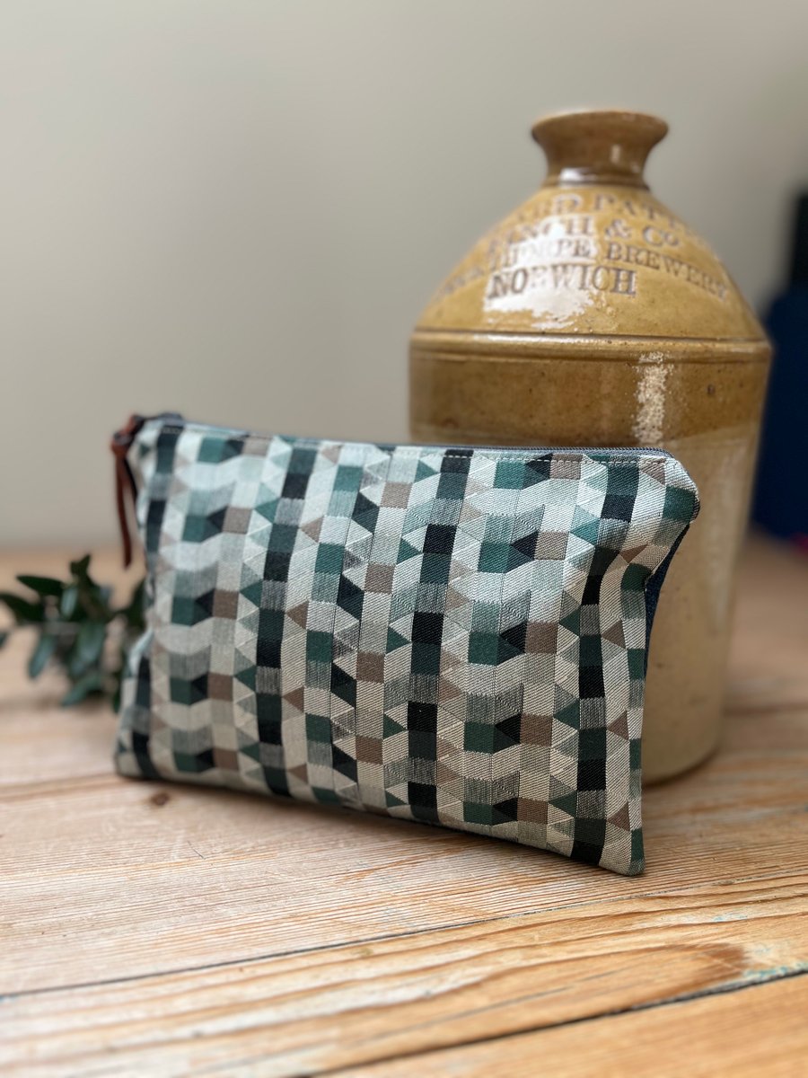 Green geometric pattern and reclaimed denim zip pouch