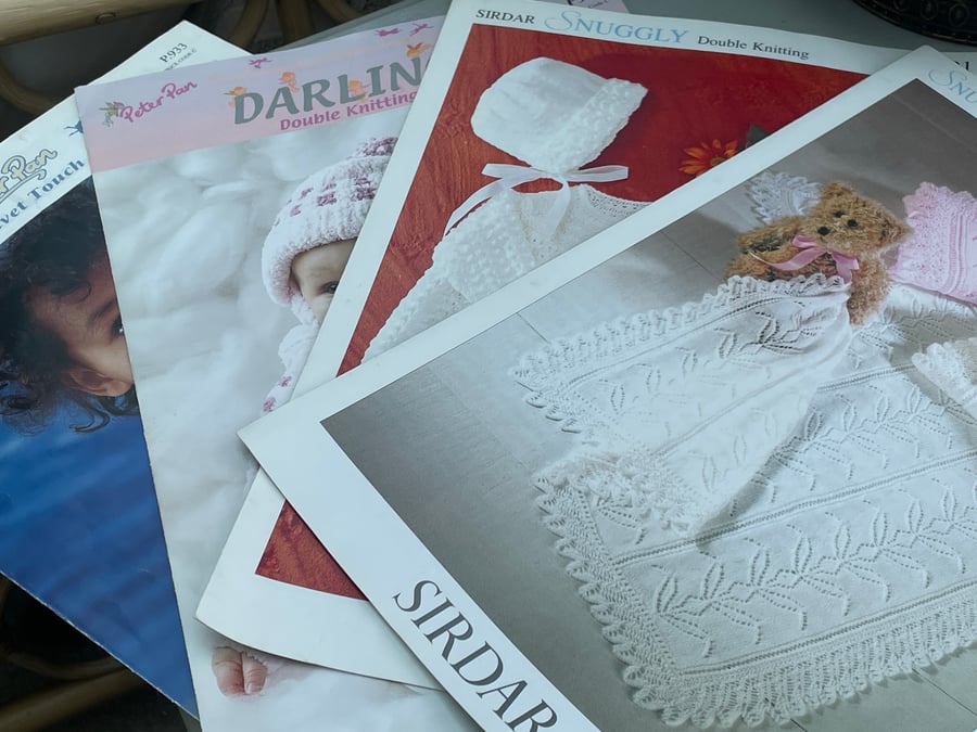 Four vintage knitting patterns for babies and children