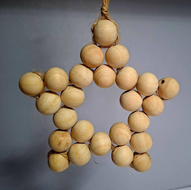 Large rustic star made with wooden beads and jute string