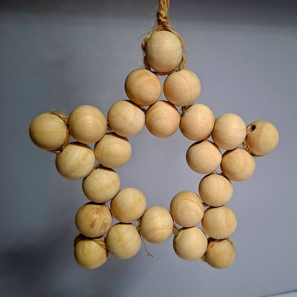 Large rustic star made with wooden beads and jute string