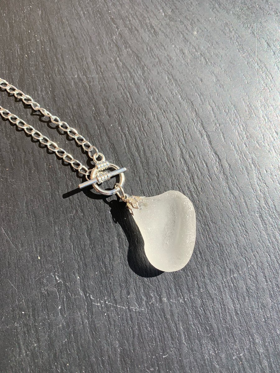 White seaglass drop on silver plate mount & 22in SP toggle fastening chain