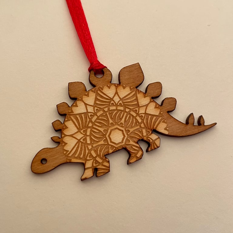 Etched wooden dinosaur decoration