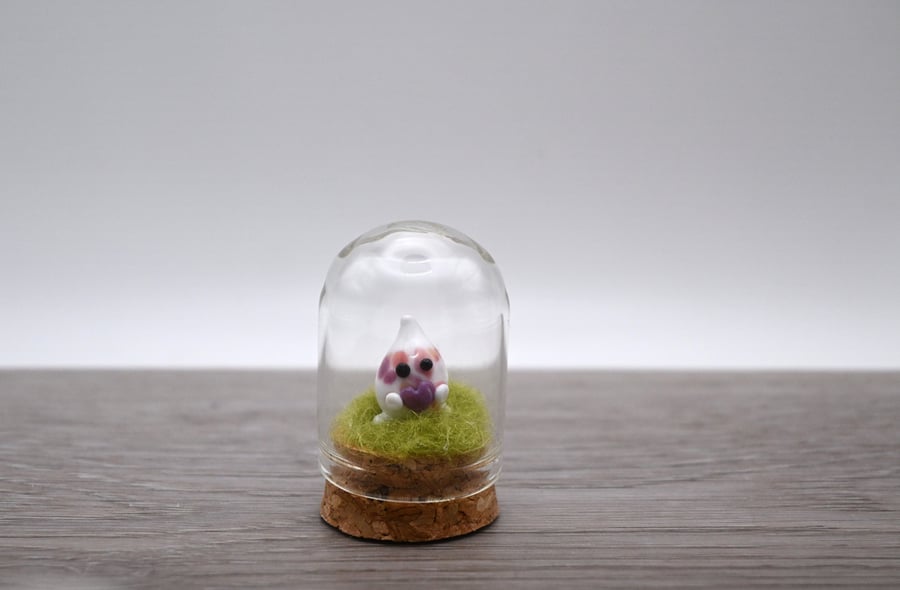 small glass wisp keepsake figure