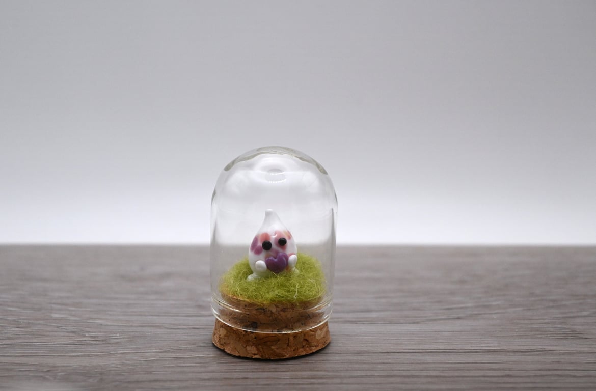 small glass wisp keepsake figure