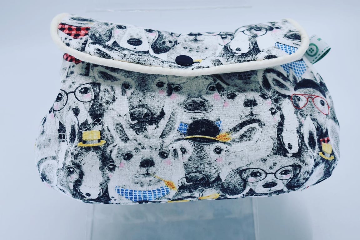 Cosmetic or make up bag. Pet lover gift featuring a fun print of animals.