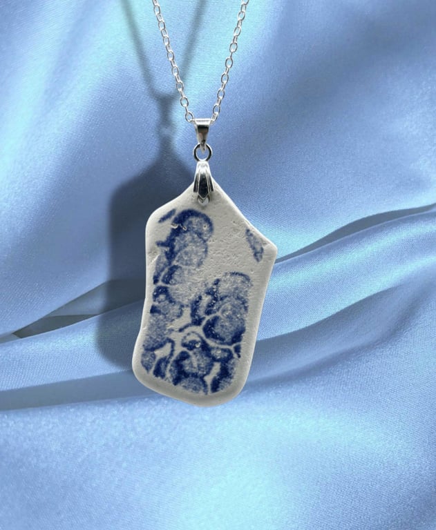 Sea pottery necklace. Blue floral design, beautifully smooth piece.