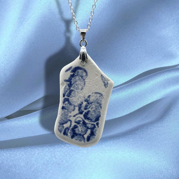 Sea pottery necklace. Blue floral design, beautifully smooth piece.