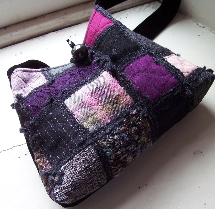 One of a kind textile art shoulder bag in purple and black patchwork