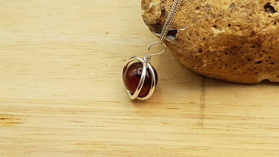 Red Black Sardonyx circle pendant. August birthstone. Minimalist sterling silver
