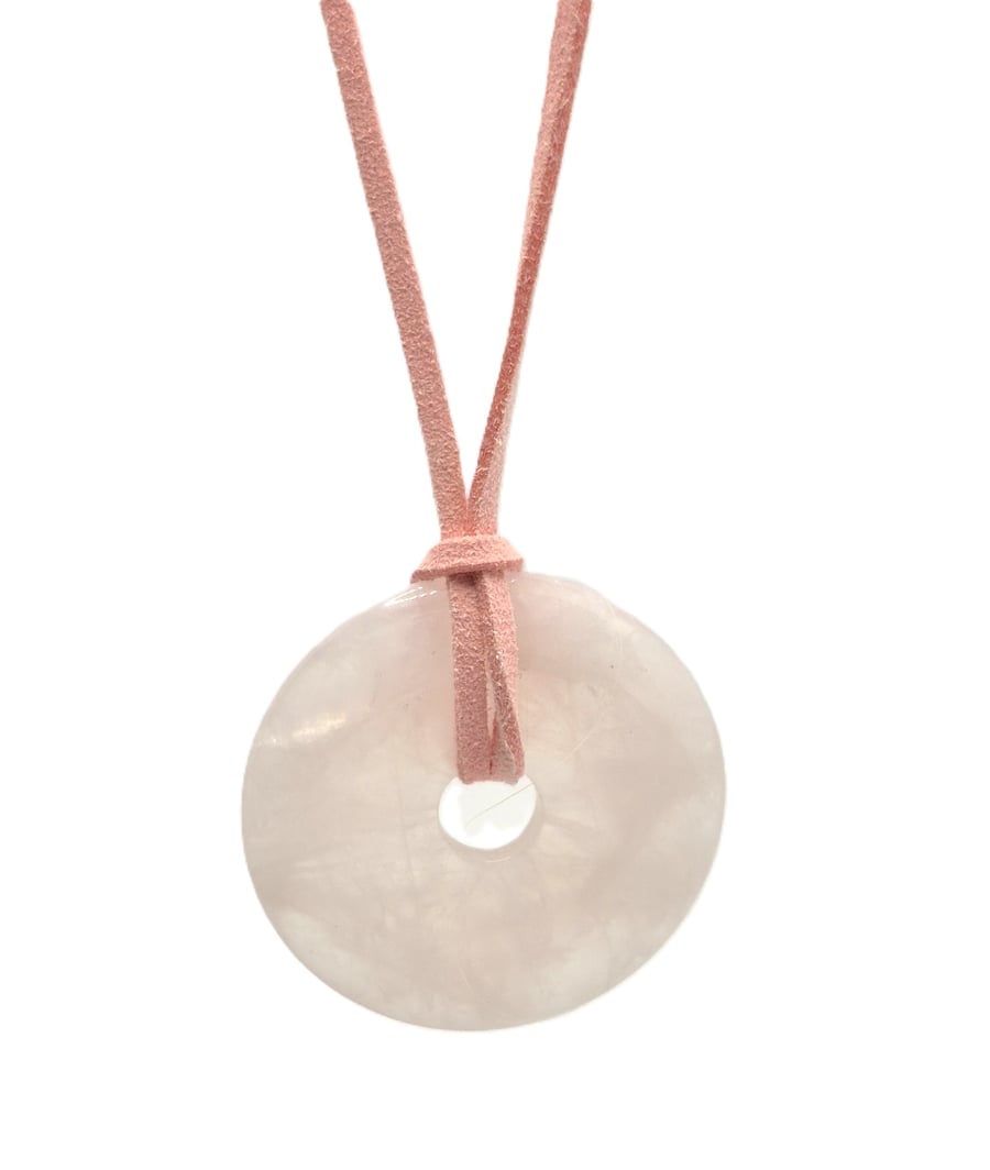 Large rose quartz donut pendant with pink faux leather cord