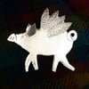 Flying pig brooch