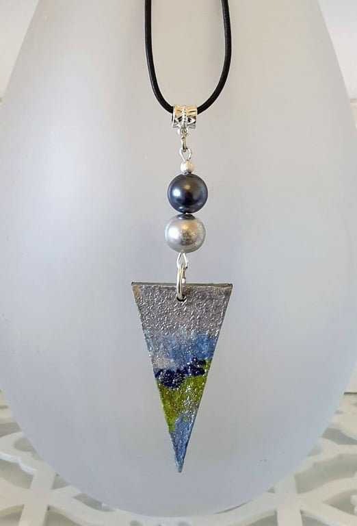 Geometric wood pendant on leather cord