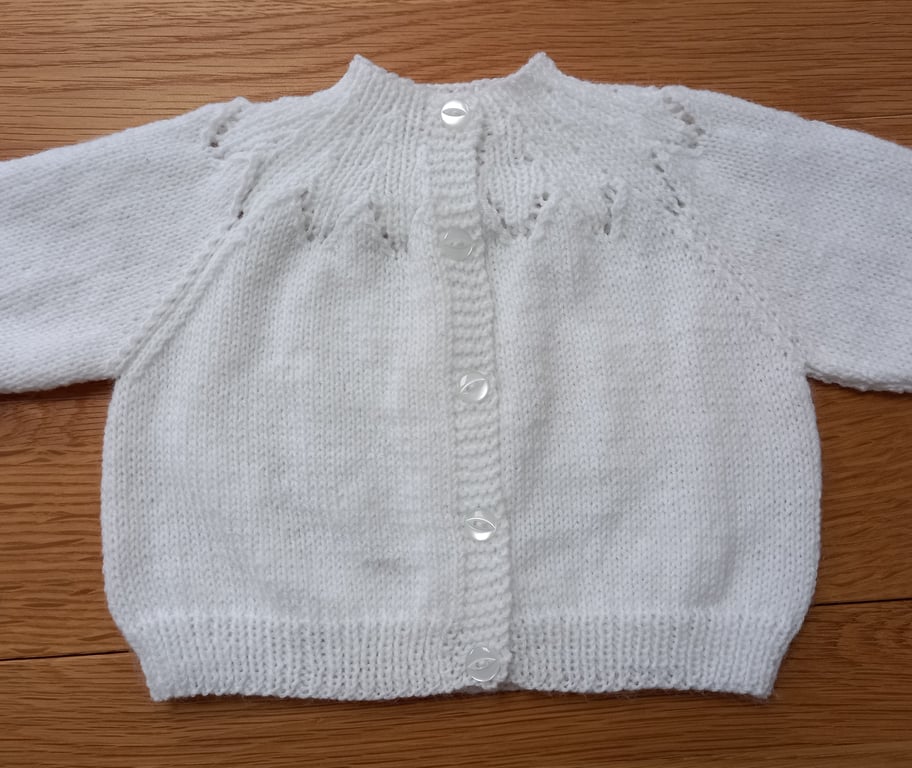 Handknitted white baby cardigan, approx 0-3 months, to fit a 16" chest