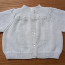 Handknitted white baby cardigan, approx 0-3 months, to fit a 16" chest