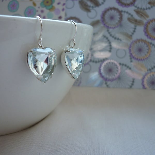 CRYSTAL AND STERLING SILVER FACETED HEART RHINESTONE EARRINGS. 