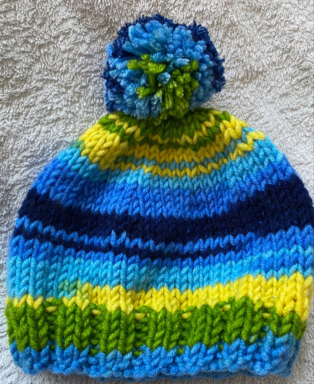 Blue eyed baby hat, hand-knitted
