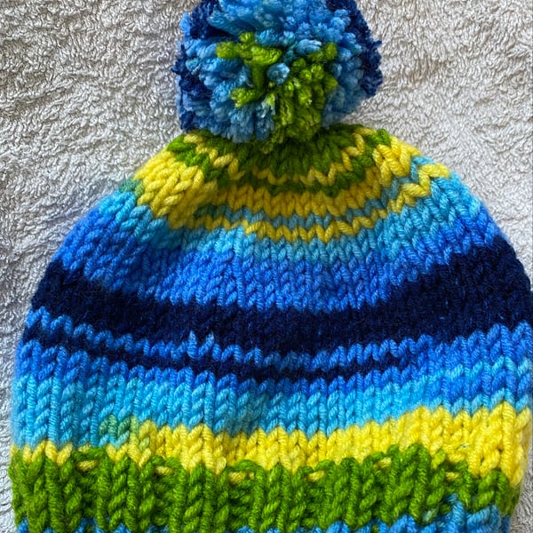 Blue eyed baby hat, hand-knitted
