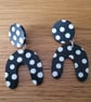Retro Style Stud and Drop Wonky Arch Earrings in a Black and White Spot Pattern - Image 1