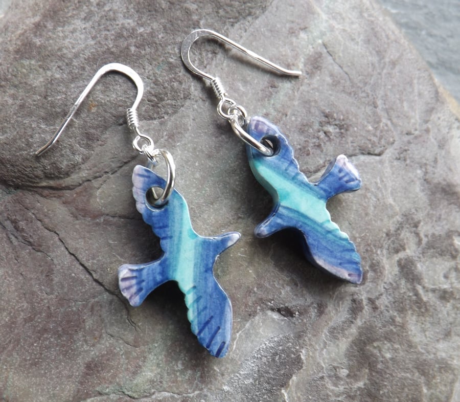 Handmade ceramic bird earrings in blue, turquoise and purple