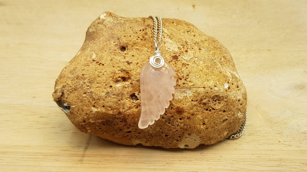 Rose Quartz angel wing pendant necklace. Reiki jewelry uk. January birthstone
