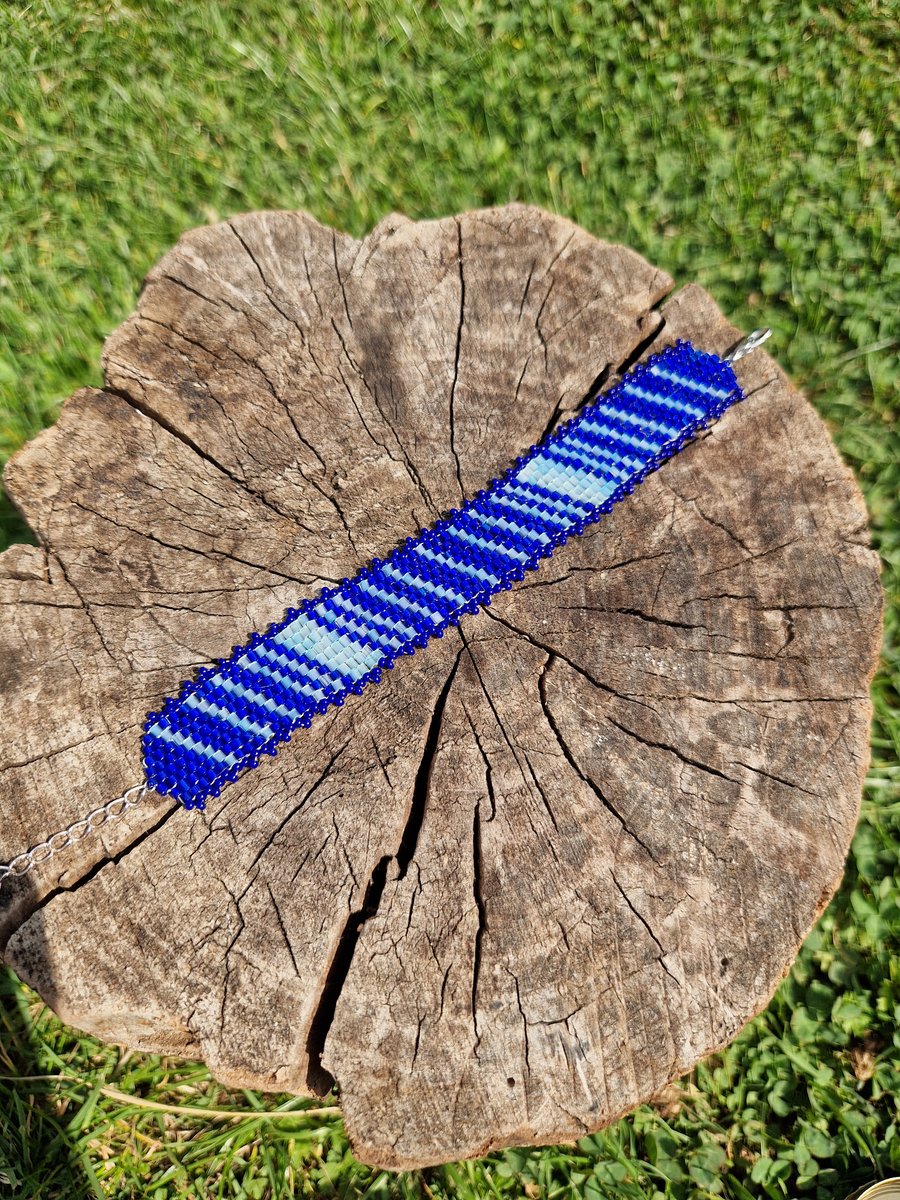 Shimmering blue peyote beaded cuff bracelet