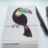 applique & free motion embroidered zombie toucan notebook