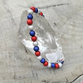 BR420 Red, white and blue miracle bead bracelet