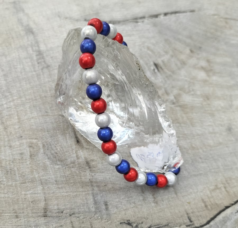 BR420 Red, white and blue miracle bead bracelet