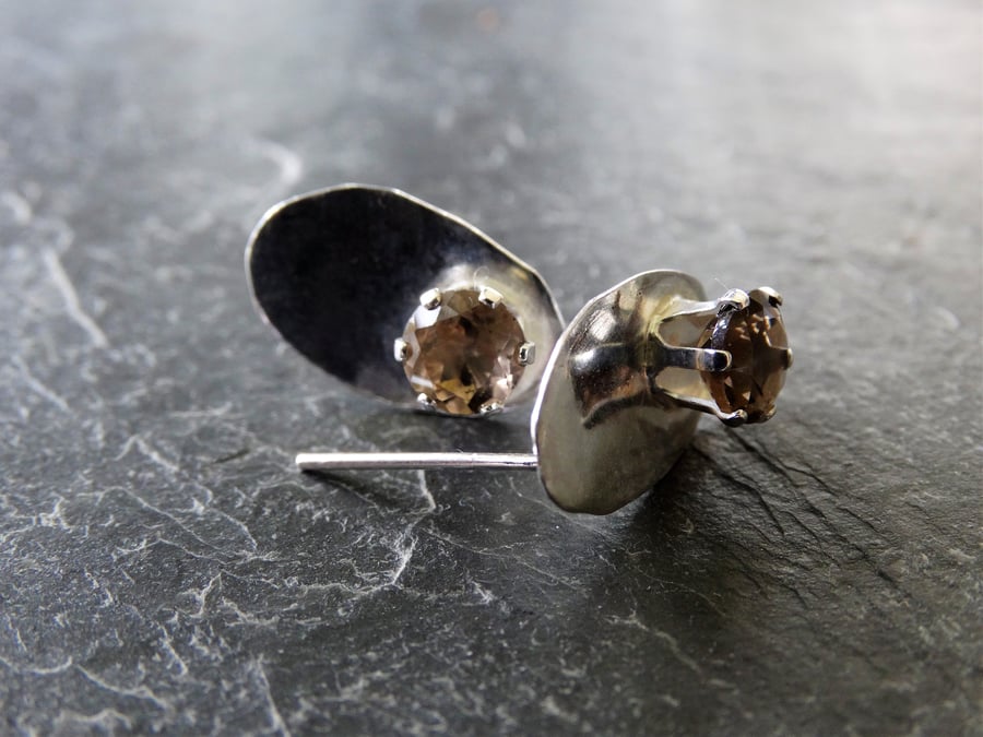 Polished sterling silver ovals set with faceted smokey quartz