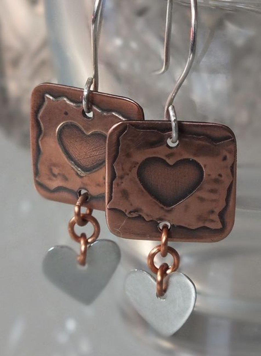Copper and silver heart earrings