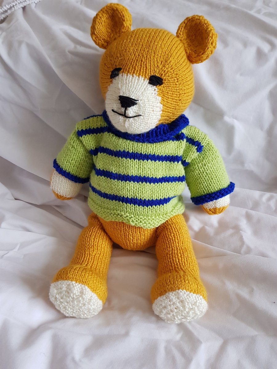 Hand knitted soft teddy bear 