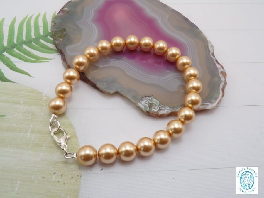 Gold Round Pearl beaded Silver Bracelet.