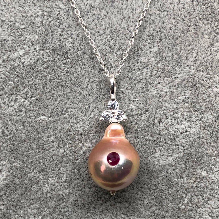 Freshwater Metallic Cultured Pearl set with a Ruby, Zircons and Sterling Silver