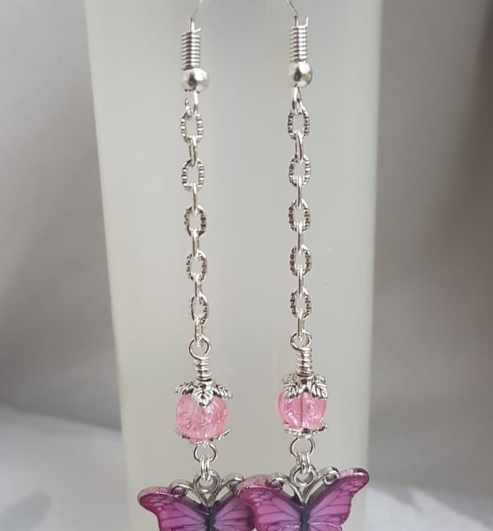 Gorgeous Dangly Pink Butterfly Earrings - Silver Tones.