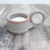 White and pink ceramic tealight holder with handle