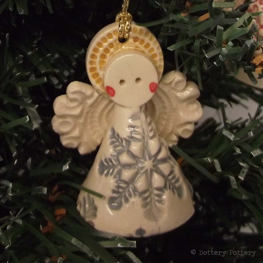 Teeny little ceramic angel Christmas decoration snowflake design pottery angel
