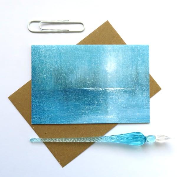 Cellophane free moon over the ocean artist blank art card