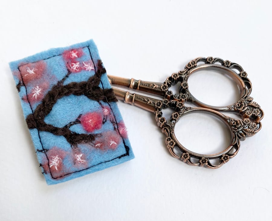 Embroidered cherry blossom brooch pin of badge. 