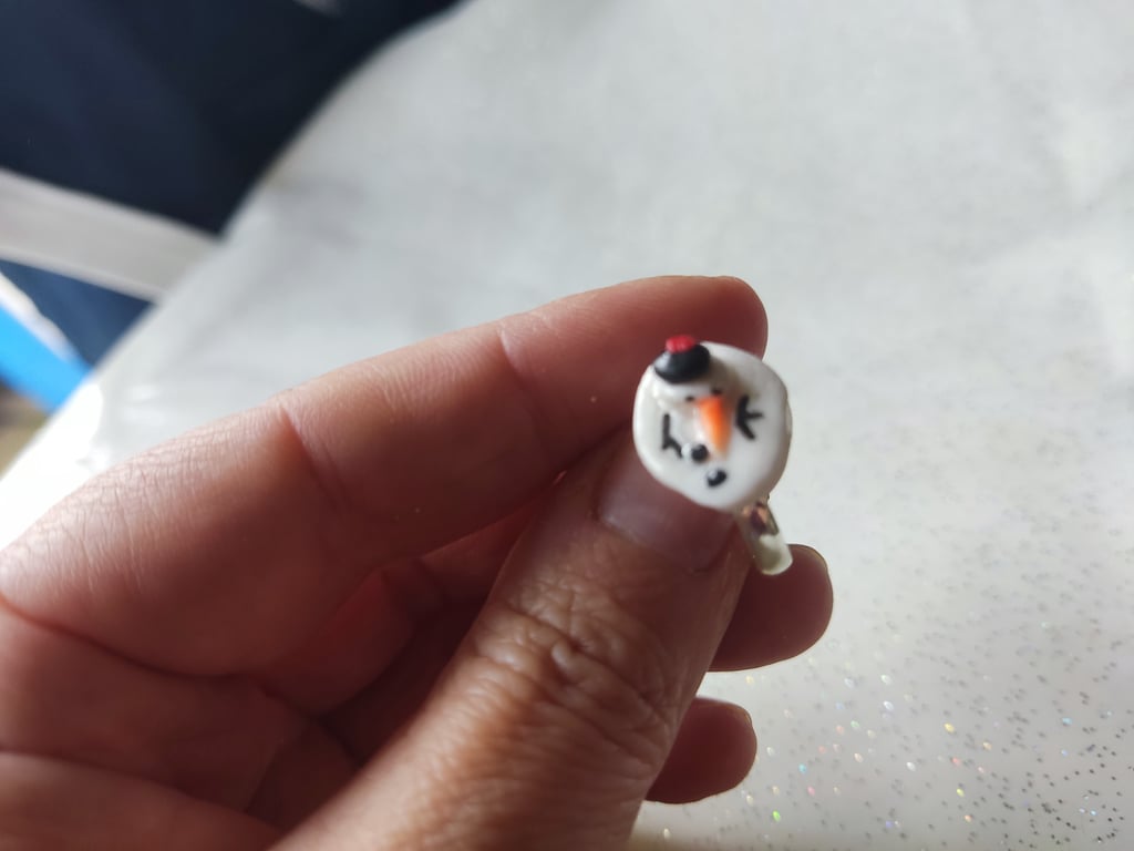 Handmade melted snowman polymer clay ring
