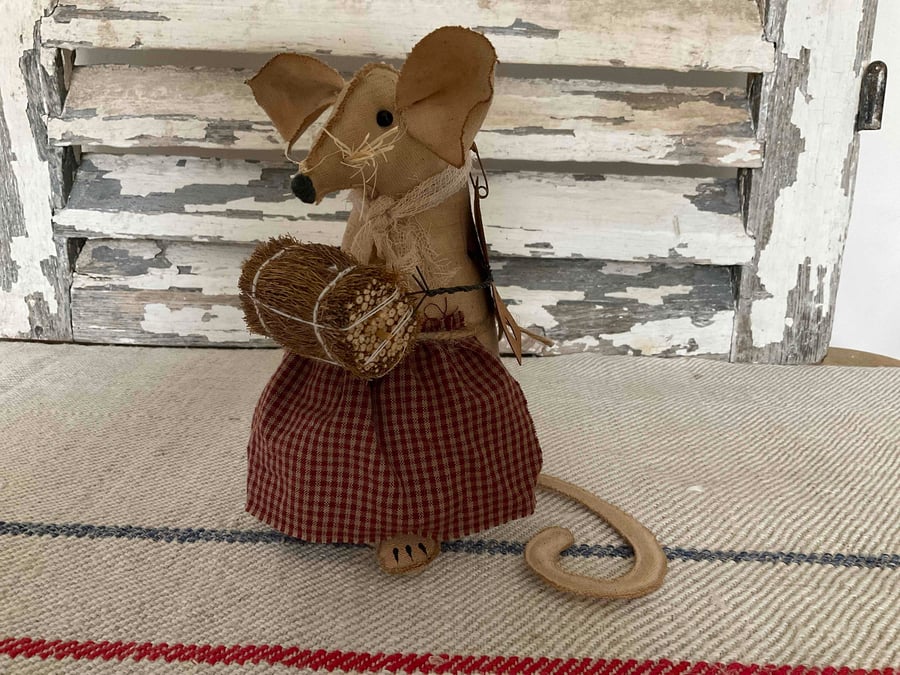 A handmade primitive harvest mouse