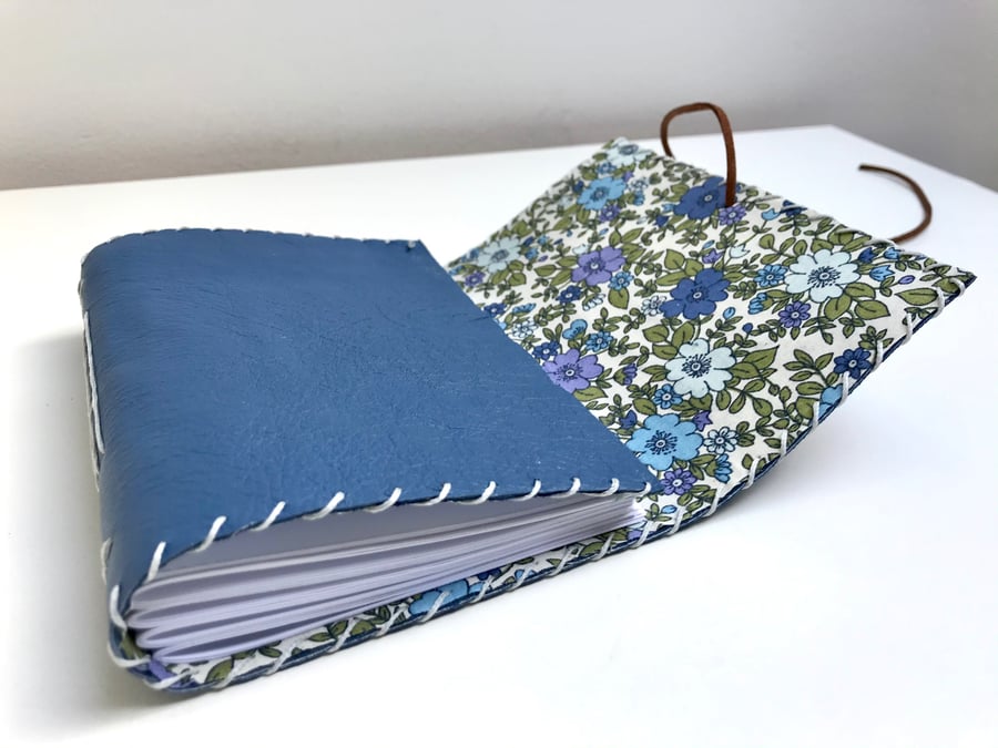 A6 Handmade Leather notebook Blue floral fabric lining plain paper