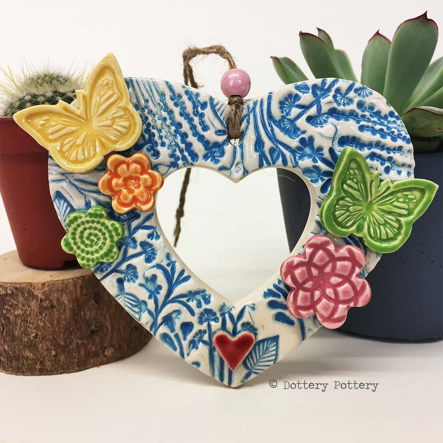 Heart shaped Ceramic floral wreath decoration with butterflies and flowers 