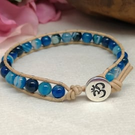 Blue agate and tan leather with Om button fastener 