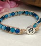 Blue agate and tan leather with Om button fastener  - Image 1