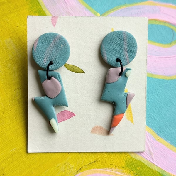Blue, lilac and orange lightening bolt dangly earings 
