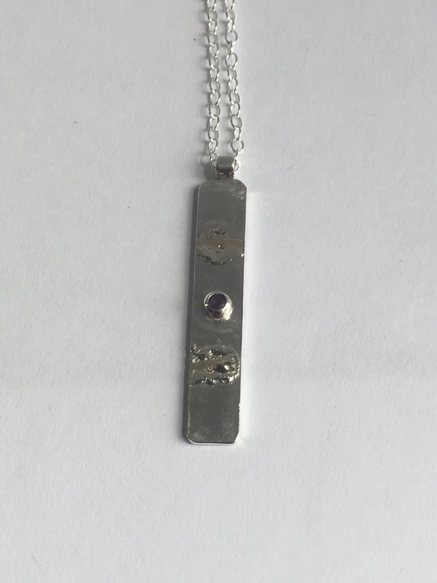 Ruby grounding pendant 