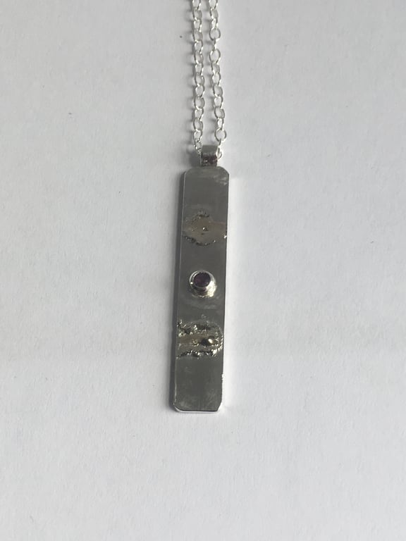 Ruby grounding pendant 