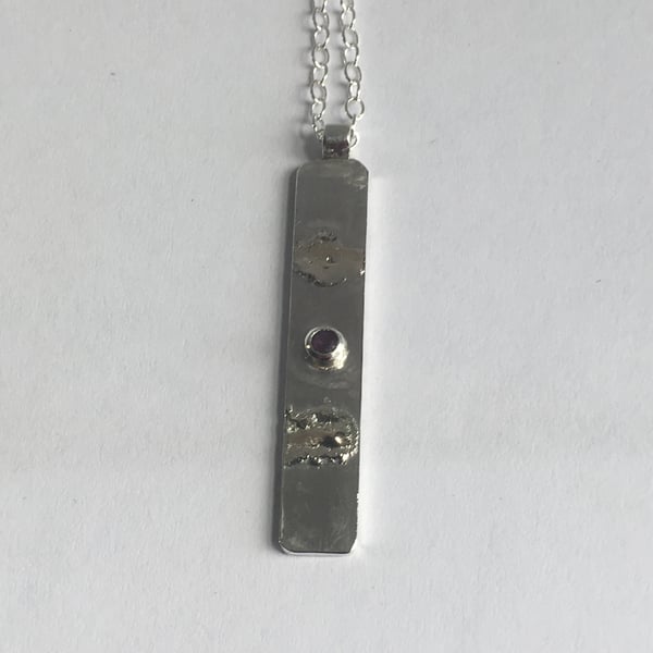 Ruby grounding pendant 