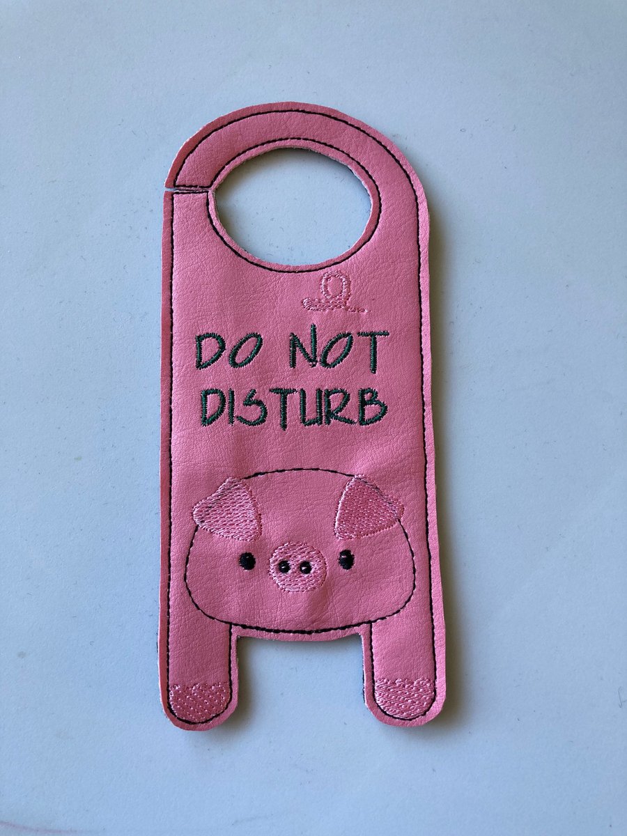 828. Pig door hanger